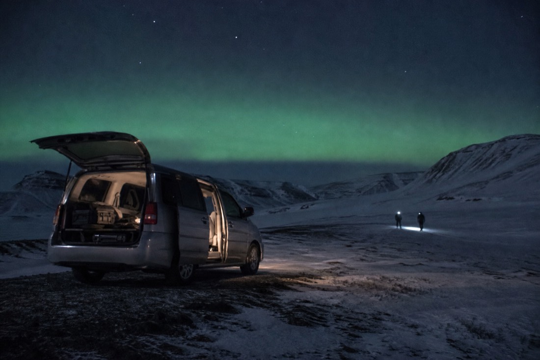 A minivan aurora-tour stop away from Longyearbyen's lights during the Svalbard polar night